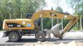 Колёсный экскаватор Cat318D сдам в аренду