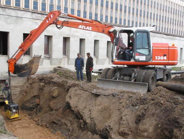 Аренда колёсного полноповоротного экскаватора ATLAS 1304 M
