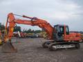 Болотный экскаватор Fiat Hitachi 210