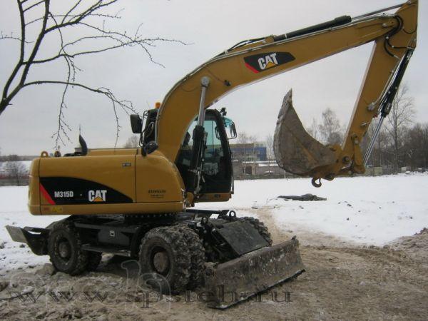 Колёсный полноповоротный экскаватор в аренду