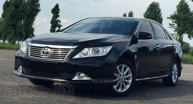 Водитель со своим автомобилем