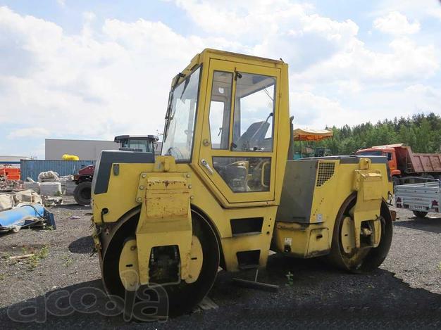Асфальтовый тандемный каток Bomag 144 8,5 т, разрезные вальцы
