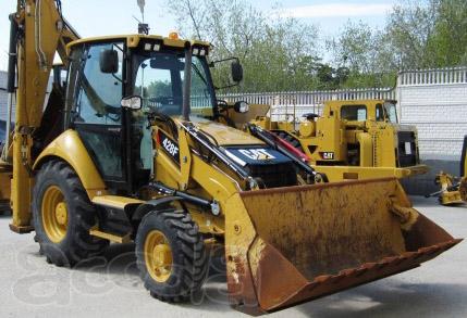 Аренда экскаватора-погрузчика CAT 428