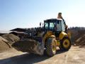 Экскаватор-погрузчик New Holland 115