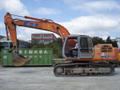 Аренда гусеничного экскаватора hitachi ex210