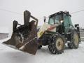 Экскаватор-погрузчик с вилами TEREX