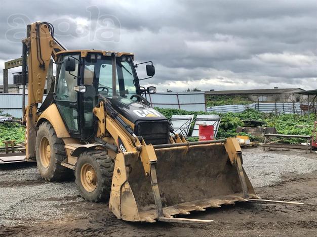 Экскаватор-погрузчик Caterpillar 428E